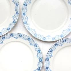 8 assiettes anciennes à la frise d'étoiles