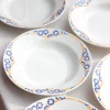 8 assiettes creuses aux marguerites bleues