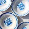 8 assiettes creuses en faïence blanche fleurie