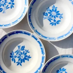 8 assiettes creuses en faïence blanche fleurie