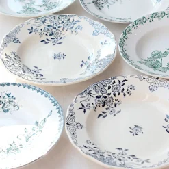 7 Assiettes dépareillées en terre de fer