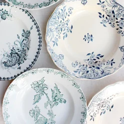 7 Assiettes dépareillées en terre de fer