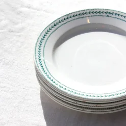 6 assiettes en terre de fer aux lauriers