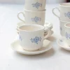 6 tasses fleuries et leur soucoupe