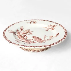 Assiette sur pied au décor brun