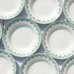 Assiettes anciennes à la frise verte