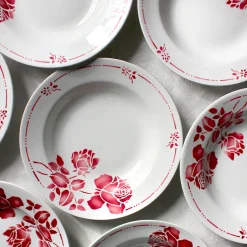Assiettes creuses à la fleur rouge