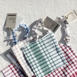 Bavoir enfant à carreaux