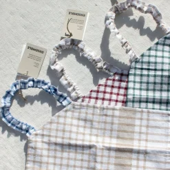 Bavoir enfant à carreaux