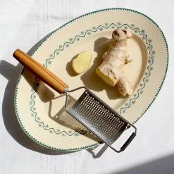 Râpe en inox manche en bois de prunier